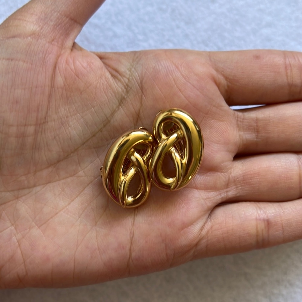Vintage Givenchy clip on gold earrings.